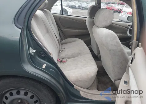 2000 Toyota Corolla Le from USA, damaged, VIN 2T1BR12E2YC309516